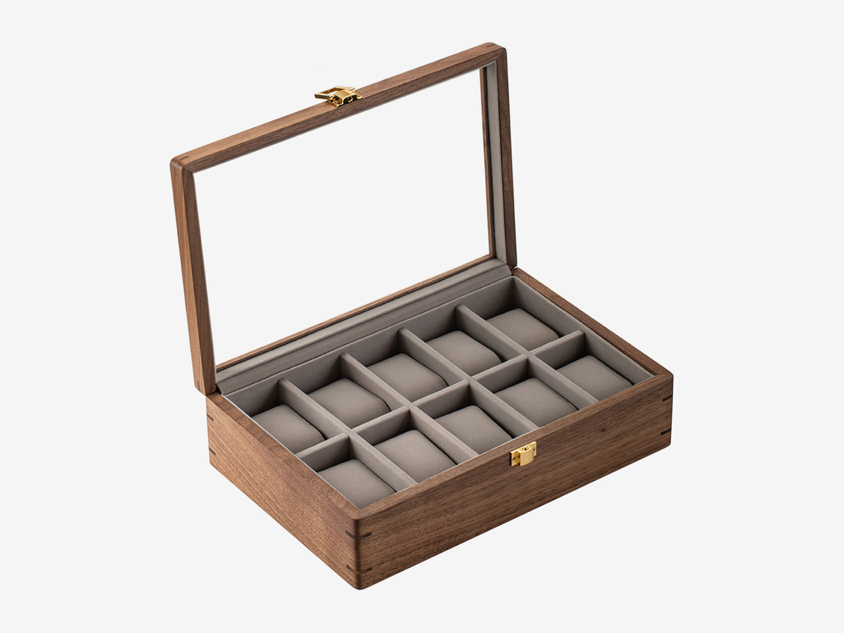 Open solid walnut 10-slot watch box with glass lid and flannel-lined compartments