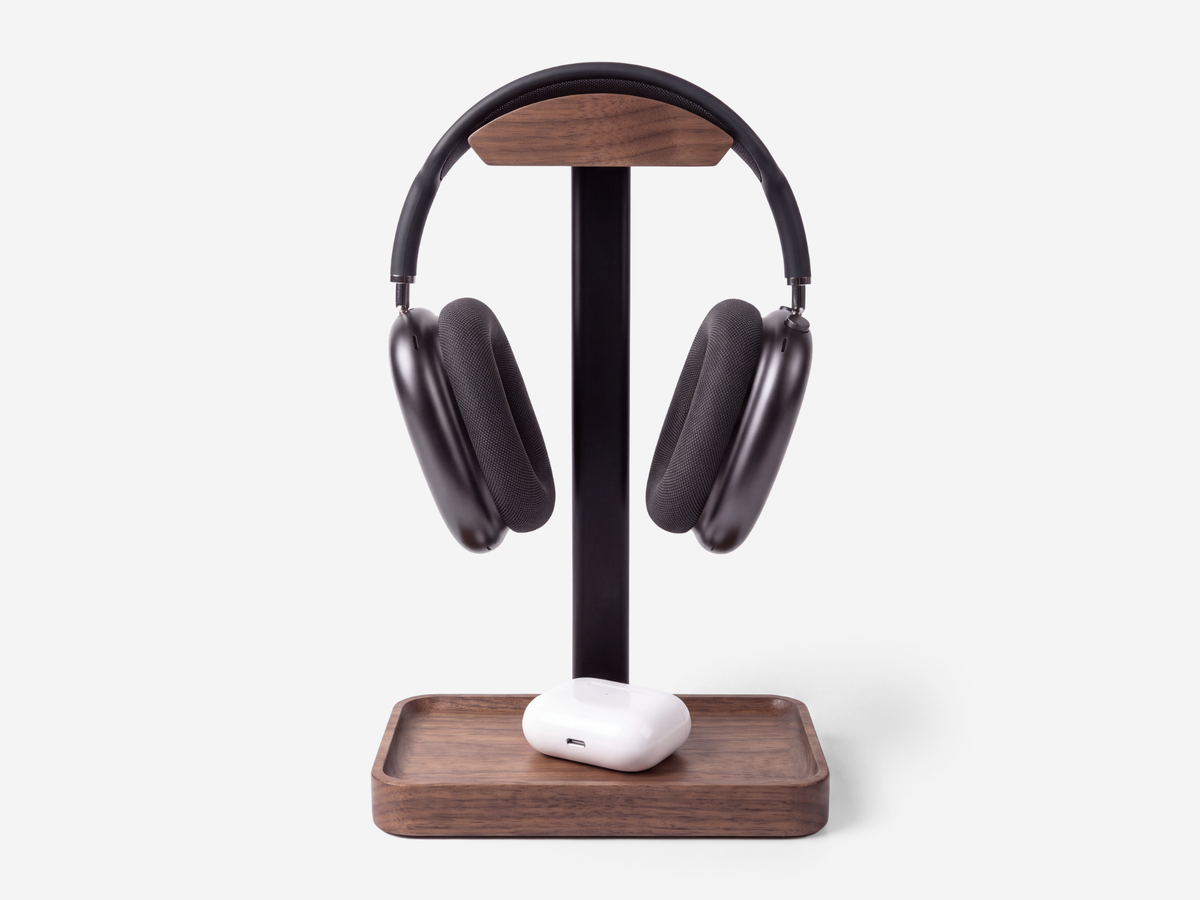 Walnut headphone stand detail with integrated storage tray #Material_Walnut