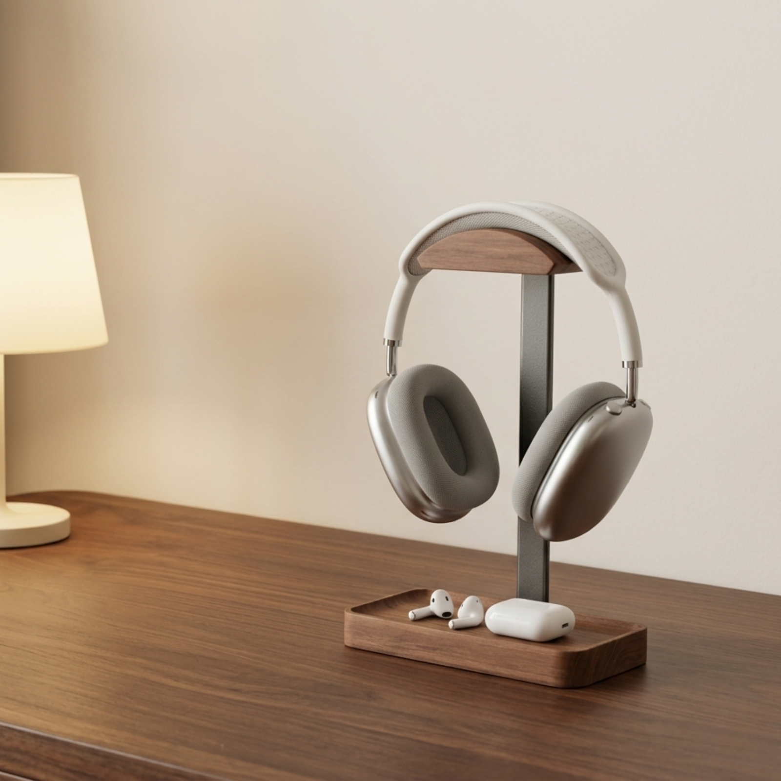 Walnut headphone stand on a warm wooden desk with over-ear headphones #Material_Walnut