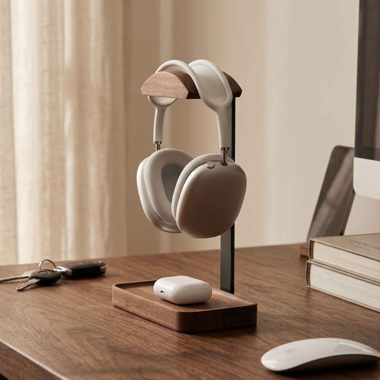 Walnut headphone stand in an organized workspace with headphones and desk essentials #Material_Walnut